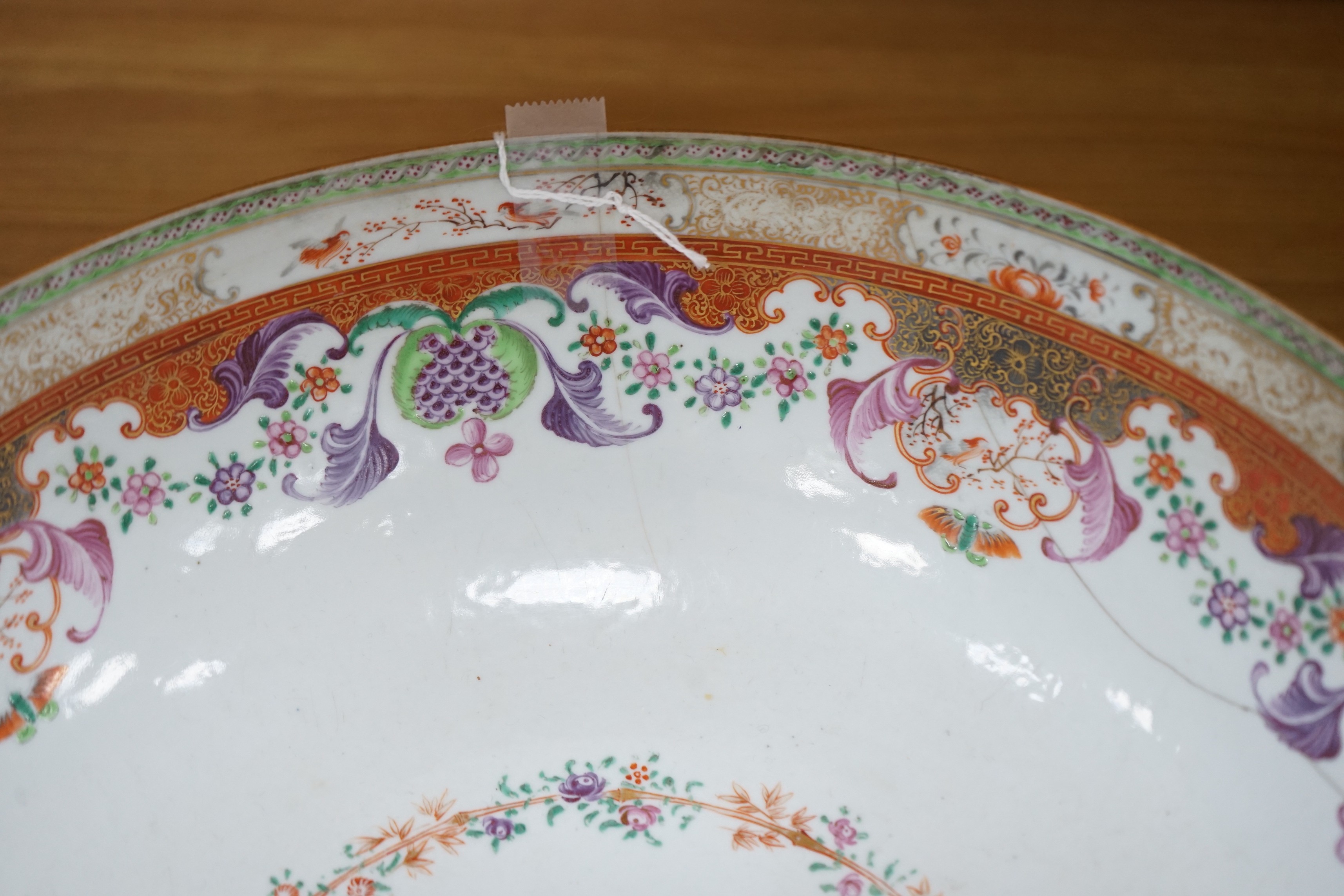 An 18th century Chinese export famille rose ‘mandarin’ punch bowl, 31cm diameter (af)